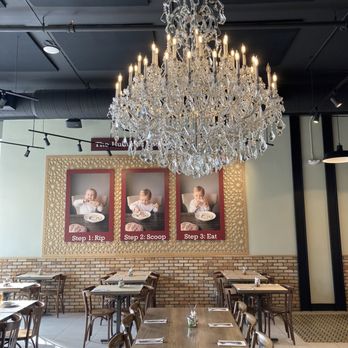 Oren’s Hummus - Pretty chandelier & "The Hummus Eating Guide" on the wall :) - Mediterranean Near Me - Los Gatos, California