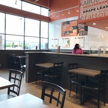 Mr. Kabob Xpress Grille & Catering Southfield - a woman sitting at the counter - Mediterranean Near Me - Southfield, Michigan Mr. Kabob Xpress Grille & Catering Southfield - a woman sitting at the counter - Mediterranean Near Me - Southfield, Michigan