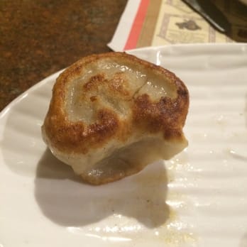 Leo's Kitchen - The last potsticker, I think it's home made , very good . Spicy mustard is extra spicy - Chinese Near Me - Roseville, California
