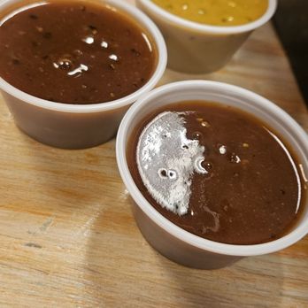 Yellow Rose BBQ - Some of their yummy sauces!! House ( darker one) and a mustard sauce both are delicious - Barbeque Near Me - Jacksonville, Florida Yellow Rose BBQ - Some of their yummy sauces!! House ( darker one) and a mustard sauce both are delicious - Barbeque Near Me - Jacksonville, Florida