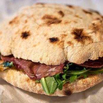 Bocconcino Hawaii - Illegal panino (AKA IG special) - Bresaola, Toma Casstelrosso cheese, sun-dried zucchini, honey mustard, balsamic pearls, arugula on Puccia - Pizza Near Me - Honolulu, Hawaii Bocconcino Hawaii - Illegal panino (AKA IG special) - Bresaola, Toma Casstelrosso cheese, sun-dried zucchini, honey mustard, balsamic pearls, arugula on Puccia - Pizza Near Me - Honolulu, Hawaii