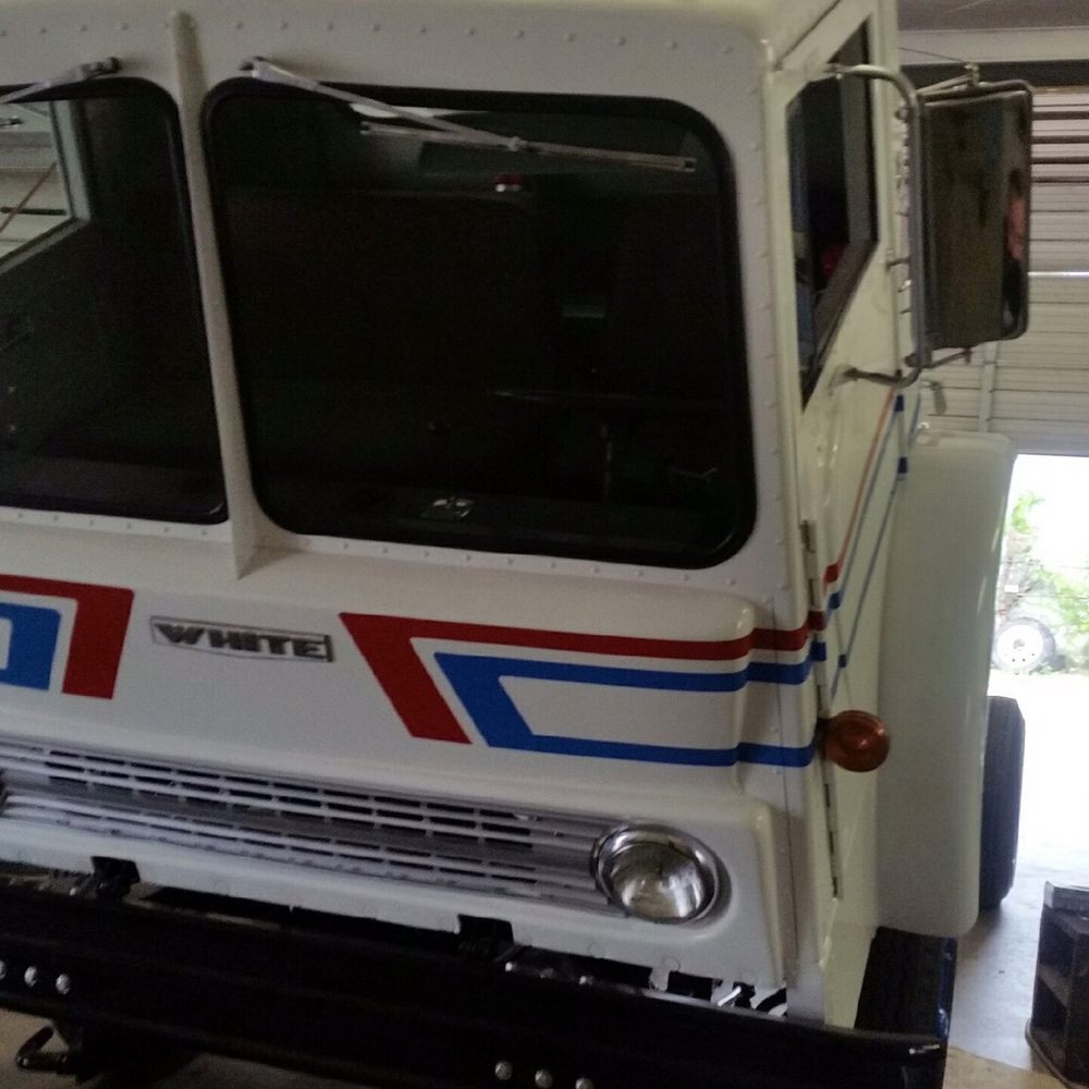 Lone Star Truck Group - Working on/repairing the first truck that Corley Wetsel used for business in 196(4)?  Display truck now. - Commercial Truck Dealers Near Me - Abilene, Texas