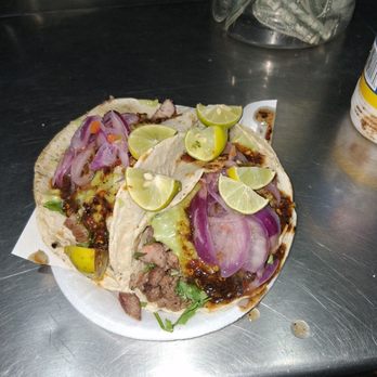 Tijuana - Tacos de asada y al pastor with marinated red onions, salsa verde y rojo abd fresh radishes, limon y limas. - Local Flavor Near Me - San Diego, AGU