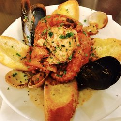 Cachúk Degustacion - Like very octopus (Pulpo) with seafood (Cacchuco ala Livornese) with toasted bread