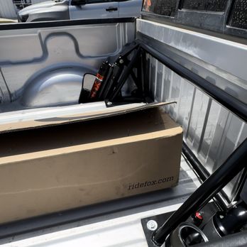 Off Road Warehouse - Bed rack installed with my old shocks in the box - Tires Near Me - Corona, California Off Road Warehouse - Bed rack installed with my old shocks in the box - Tires Near Me - Corona, California