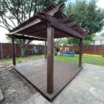 Astro Paint - a patio with a pergol roof - Painters Near Me Astro Paint - a patio with a pergol roof - Painters Near Me