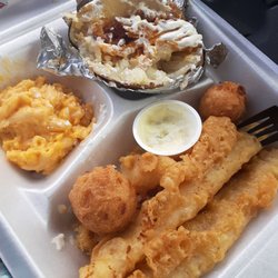 Fish, loaded baked potato, mac n cheese and hush puppies. Yum!