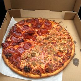 a pepperoni pizza in a box