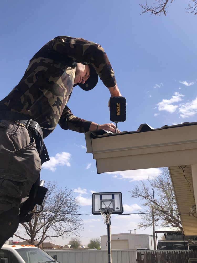 Slide of Dinger Roofing