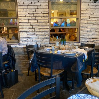 Vecchia Osteria - a dining area with blue chairs and tables - Italian Near Me - Newtown, Pennsylvania Vecchia Osteria - a dining area with blue chairs and tables - Italian Near Me - Newtown, Pennsylvania