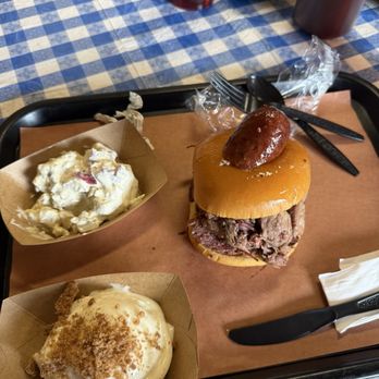 Ridgewood Brothers’ BBQ - Bronco sandwich with potato salad and key lime crumble - Barbeque Near Me - Russellville, Arkansas Ridgewood Brothers’ BBQ - Bronco sandwich with potato salad and key lime crumble - Barbeque Near Me - Russellville, Arkansas