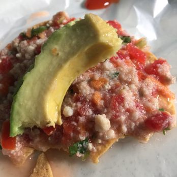 Mariscos Cisneros - Ceviche tostada while we wait for our food. Tastes great! - Mexican Near Me - Puerto Vallarta, JAL Mariscos Cisneros - Ceviche tostada while we wait for our food. Tastes great! - Mexican Near Me - Puerto Vallarta, JAL