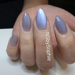 This is a structure gel Mani all natural nail .with #A4 and #18 cateye. To book please send me a text