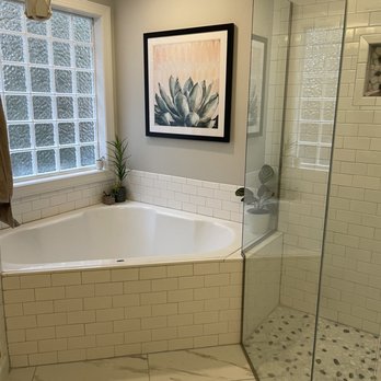 The Wright Allure - a bathtub in a bathroom - Flooring Near Me