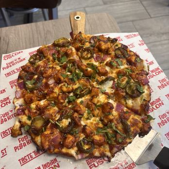 Naan Twist Indian Food Riverside - Achari chicken pizza medium heat, size small (can feed 2 people) - Indian Near Me - Riverside, California Naan Twist Indian Food Riverside - Achari chicken pizza medium heat, size small (can feed 2 people) - Indian Near Me - Riverside, California