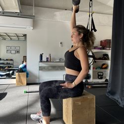 Yael Personal Trainer - Working on a overhead press to strengthen the shoulders.
