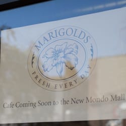 Marigolds sign at the door. (Still says it is coming soon, but they are open)