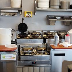 Waffle House - Filthy waffle station. Grateful the Waffles don't taste like the station looks.