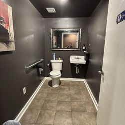 The Library Cigar Lounge - Men's bathroom.
