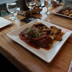 P S Restaurant - Asian Duck entree & pork chop entree.