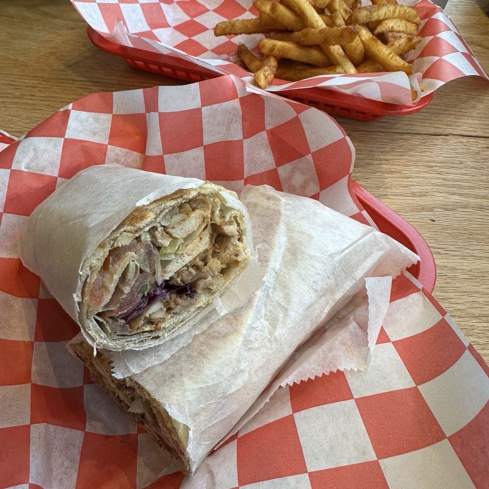 Scott's Shawarma - Chicken Shawarma On Saj bread. Battered French Fries. - Delis Near Me - Richmond, Virginia Scott's Shawarma - Chicken Shawarma On Saj bread. Battered French Fries. - Delis Near Me - Richmond, Virginia