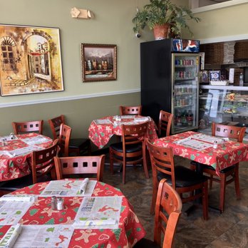 Paulis Pizza - Tables - Italian Near Me - Dania, Florida Paulis Pizza - Tables - Italian Near Me - Dania, Florida