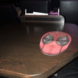 Alamo Drafthouse Cinema Charlottesville - Table and Deadpool theme menu