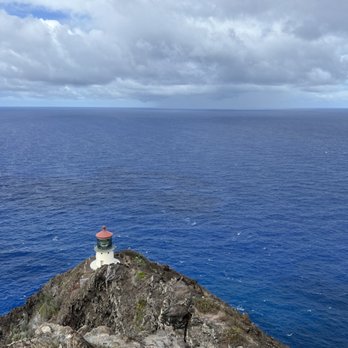 Makapu'u Point Lighthouse Trail - Makapu'u Point Lighthouse as seen from the top of the trail. - Hiking Near Me - Honolulu, Hawaii Makapu'u Point Lighthouse Trail - Makapu'u Point Lighthouse as seen from the top of the trail. - Hiking Near Me - Honolulu, Hawaii