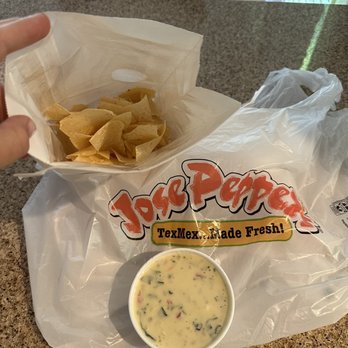 Jose Peppers - To go order: 1/3 of a bag of chips and a huge container of Espinaca con queso - Mexican Near Me - Overland Park, Kansas Jose Peppers - To go order: 1/3 of a bag of chips and a huge container of Espinaca con queso - Mexican Near Me - Overland Park, Kansas
