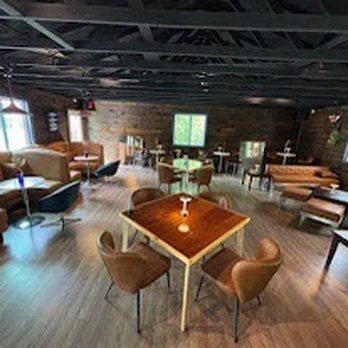 Woodfin Tavern - Indoor spaces for seating and cozy conversations - Wine Bars Near Me - Asheville, North Carolina Woodfin Tavern - Indoor spaces for seating and cozy conversations - Wine Bars Near Me - Asheville, North Carolina