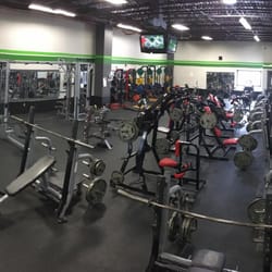 ASK Fitness - This is our "POWER" room, free weights, squat racks, and more free weights.