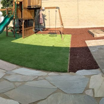 Penglin Landscaping - Backyard: pavers, artificial turf, flagstones (before gazebo was installed) - Landscaping Near Me