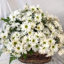 Joyce's Florist - Arrangement available year round!