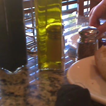 Strizzi's - table set up, balsamic and olive oil - Italian Near Me - Fremont, California Strizzi's - table set up, balsamic and olive oil - Italian Near Me - Fremont, California