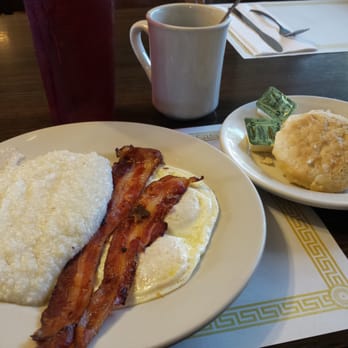 The Garden Grill - Eggs overeasy, bacon, grits and biscuit - Breakfast & Brunch Near Me - Davie, Florida The Garden Grill - Eggs overeasy, bacon, grits and biscuit - Breakfast & Brunch Near Me - Davie, Florida