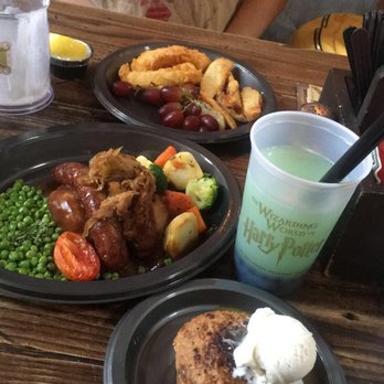 Leaky Cauldron™ - Kids Fish & Chips, Bangers & Mash, Green Fishy Ale (I love this drink! I wish we had it in Universal Hollywood) and Toffee Pudding. - British Near Me - Orlando, Florida