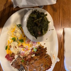 Cracker Barrel Old Country Store - Meatloaf with loaded mashed potato with greens.