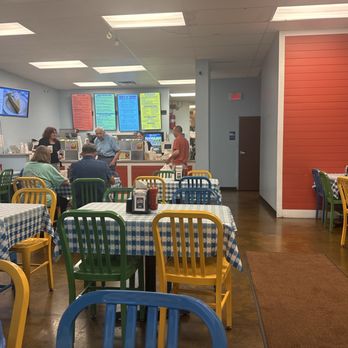 Julia Belle's - Counter and tables in the dining room. - Southern Near Me - Florence, South Carolina