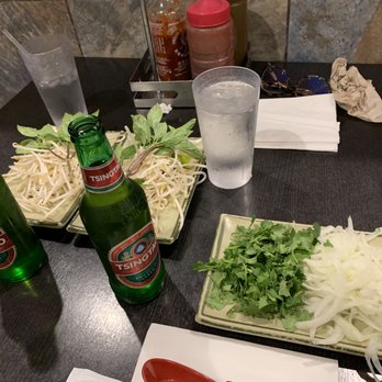 Saigon Dish - Onions, cilantro, basil and bean sprouts. Imported beer - Vietnamese Near Me - Lawndale, California