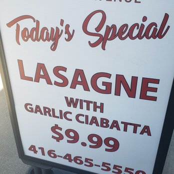 Gianni's - a sign for today's special lasagne - Italian Near Me - Toronto, Ontario