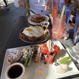 Waffle flight &  Short rib skillet Mimosa & Lost in love drinks