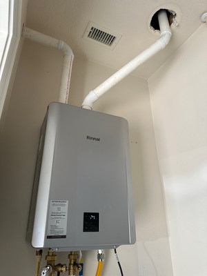 Tankless Heater Install 2025 - This customer had a traditional tank heater, but wanted to have endless hot water and greater efficiency. Original Heater was located in a closet in the garage, and we were able to save them loads of space in that closet with their new tankless system.