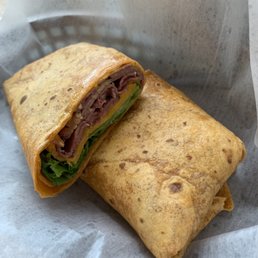 Pastrami and cheese on a tomato wrap Pastrami and cheese on a tomato wrap