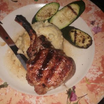 Copper Grill - Bone in pork chop - New American Near Me - Little Rock, Arkansas Copper Grill - Bone in pork chop - New American Near Me - Little Rock, Arkansas