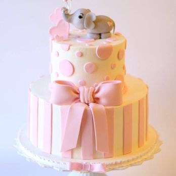 The Cake Barn - a pink and white cake with an elephant on top - Bakeries Near Me - Pineville, Louisiana