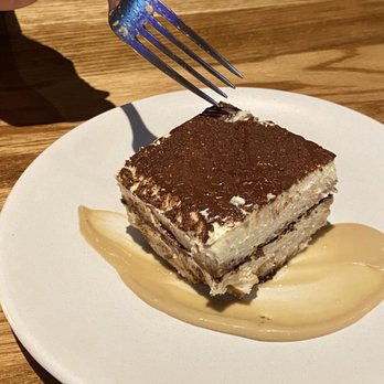 Fresko - Classic tiramisu that was not overly sweet. The sauce on the bottom is an unknown yet delicious mystery. - New American Near Me - Des Moines, Iowa Fresko - Classic tiramisu that was not overly sweet. The sauce on the bottom is an unknown yet delicious mystery. - New American Near Me - Des Moines, Iowa