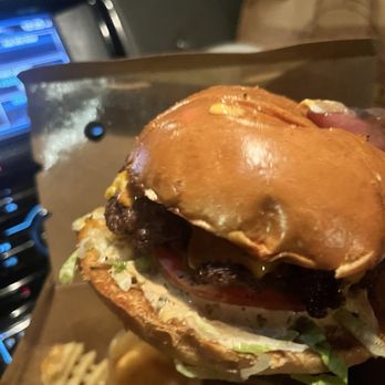 Nash & Smashed - Dark in the car, but double The Classic Bull burger. Saucy and great! - Chicken Wings Near Me - Washington, DC, District of Columbia
