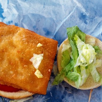 Powell's Dairy Freeze - Fish sandwich. Thick tomato and a flat square patty. - Ice Cream & Frozen Yogurt Near Me - Starke, Florida Powell's Dairy Freeze - Fish sandwich. Thick tomato and a flat square patty. - Ice Cream & Frozen Yogurt Near Me - Starke, Florida