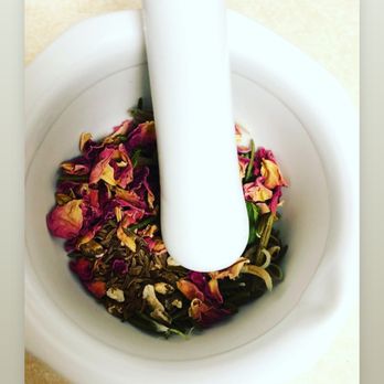 Nature & Herbs - a mortar and mortar with a stick in it - Health Markets Near Me - Baltimore, Maryland