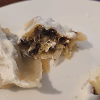 Pierogi Polish Market - Inside of mushroom saurkraut pierogies, unique and delicious - Delis Near Me - Key West, Florida Pierogi Polish Market - Inside of mushroom saurkraut pierogies, unique and delicious - Delis Near Me - Key West, Florida